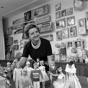 Barbie creator Ruth Handler with an assortment of Barbie and Mattel products