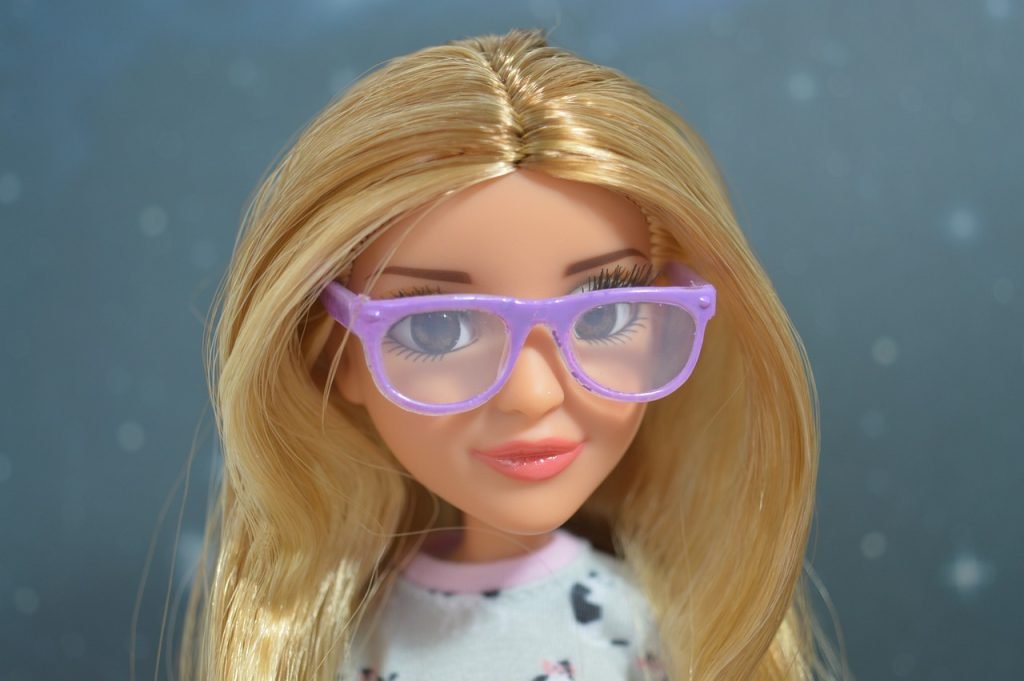 Doll wearing glasses